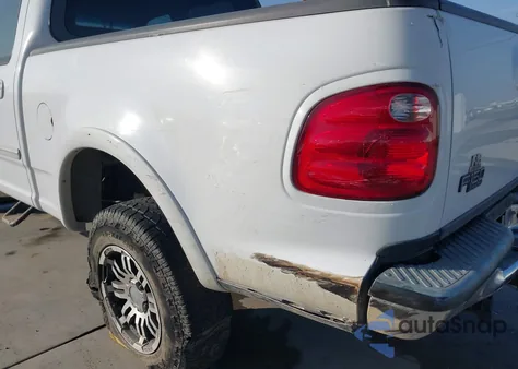 2002 Ford F-150 Lariat/Xlt z USA, uszkodzony, nr VIN 1FTRW08L82KD28620